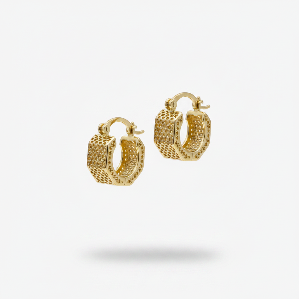 Gold hoop earrings with diamond accents on a white background