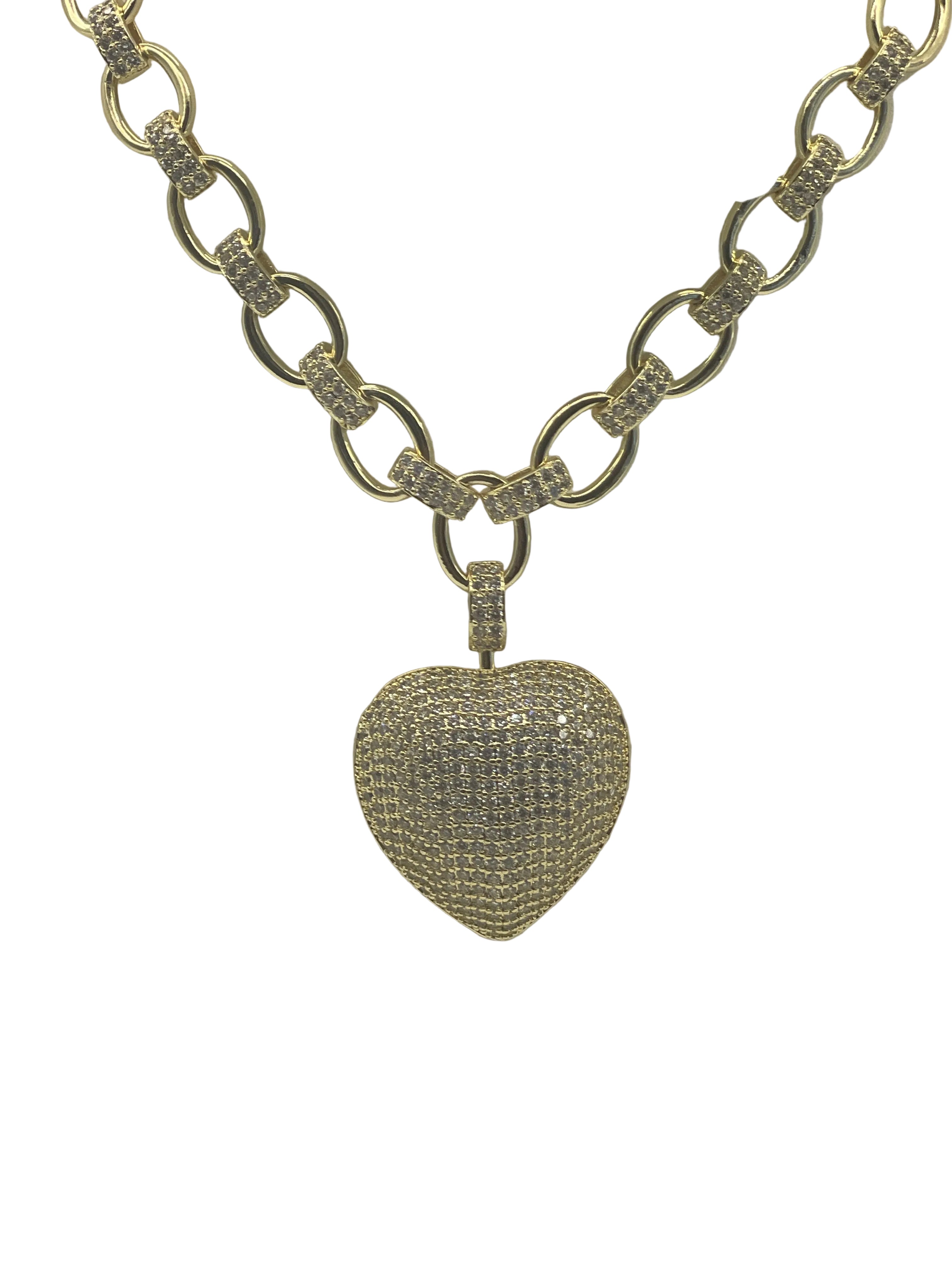 Gold chain necklace with a heart-shaped, diamond-studded pendant on a white background