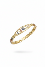 Gold bracelet with colorful gemstones on a white background