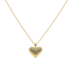 Gold heart-shaped pendant necklace on a white background