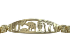 Gold bracelet with animal cut-out design on a white background